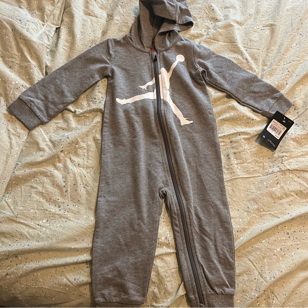 Jordan Kids Grey One Piece Onesie. Brand new with tags. 24 months.